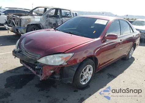 2003 Toyota Camry Le z USA, uszkodzony, nr VIN 4T1BE32K33U203726